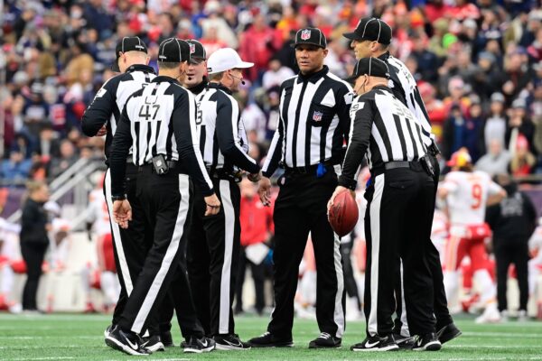 Analyzing the Officiating Crew for Every NFL Matchup in Week 5 Dec 17, 2023; Foxborough, Massachusetts, USA; NFL referee Shawn Hochuli (83) huddles with his crew during a timeout on the field during the first half of a game between the New England Patriots and the Kansas City Chiefs at Gillette Stadium. Mandatory Credit: Eric Canha-USA TODAY Sports