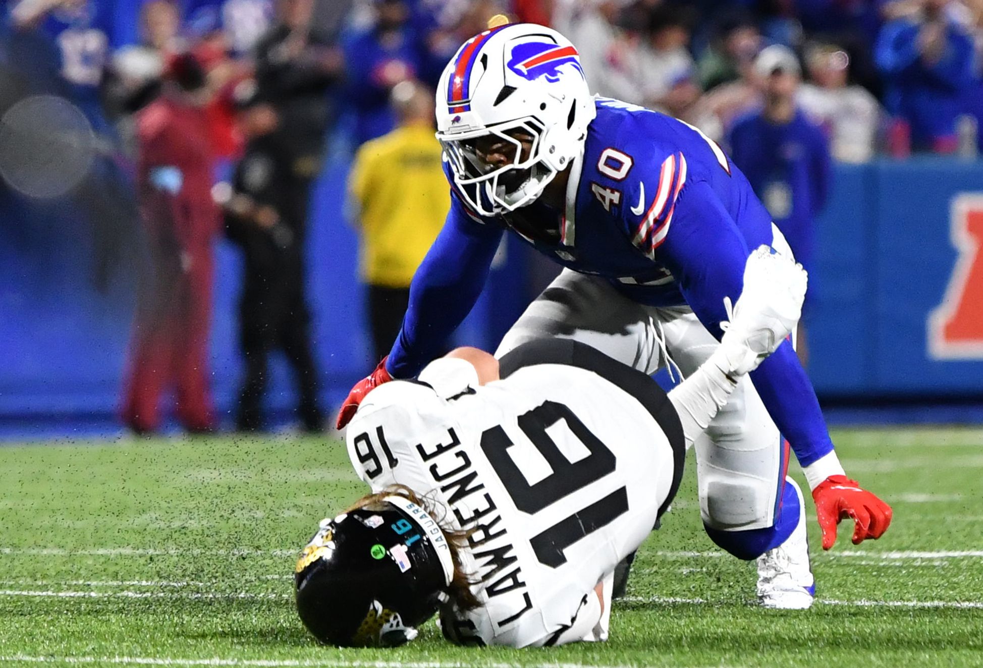 Sep 23, 2024; Orchard Park, New York, USA; Buffalo Bills linebacker Von Miller (40) sacks Jacksonville Jaguars quarterback Trevor Lawrence (16) in the fourth quarter at Highmark Stadium. Mandatory Credit: Mark Konezny-Imagn Images