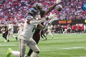 Oct 20, 2024; Atlanta, Georgia, USA; Seattle Seahawks wide receiver DK Metcalf (14) can not make a catch in the end zone defended by Atlanta Falcons cornerback A.J. Terrell (24) during the first quarter at Mercedes-Benz Stadium. Mandatory Credit: Dale Zanine-Imagn Images