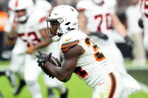 Sep 29, 2024; Paradise, Nevada, USA; Cleveland Browns running back Jerome Ford (34) rushes against the Las Vegas Raiders during the fourth quarter at Allegiant Stadium. Mandatory Credit: Stephen R. Sylvanie-Imagn Images