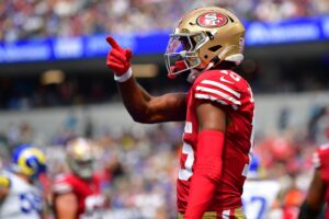 Sep 22, 2024; Inglewood, California, USA; San Francisco 49ers wide receiver Jauan Jennings (15) celebrates his touchdown scored against the Los Angeles Rams during the first half at SoFi Stadium. Mandatory Credit: Gary A. Vasquez-Imagn Images