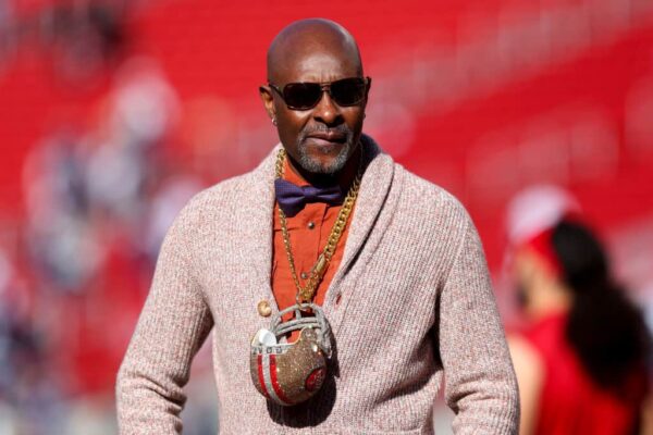 NFL Hall of Famer Jerry Rice looks on prior to a game between the Dallas Cowboys and San Francisco 49ers in the NFC Divisional Playoff game at Levi