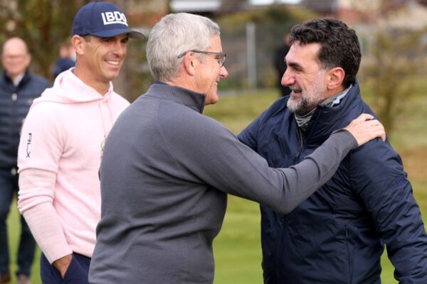 PGA Tour, LIV Golf leaders share smiles, hugs at Dunhill Links