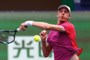 Denis Shapovalov follows through on a forehand. He lost to Giovanni Mpetshi Perricard on Friday in Basel.