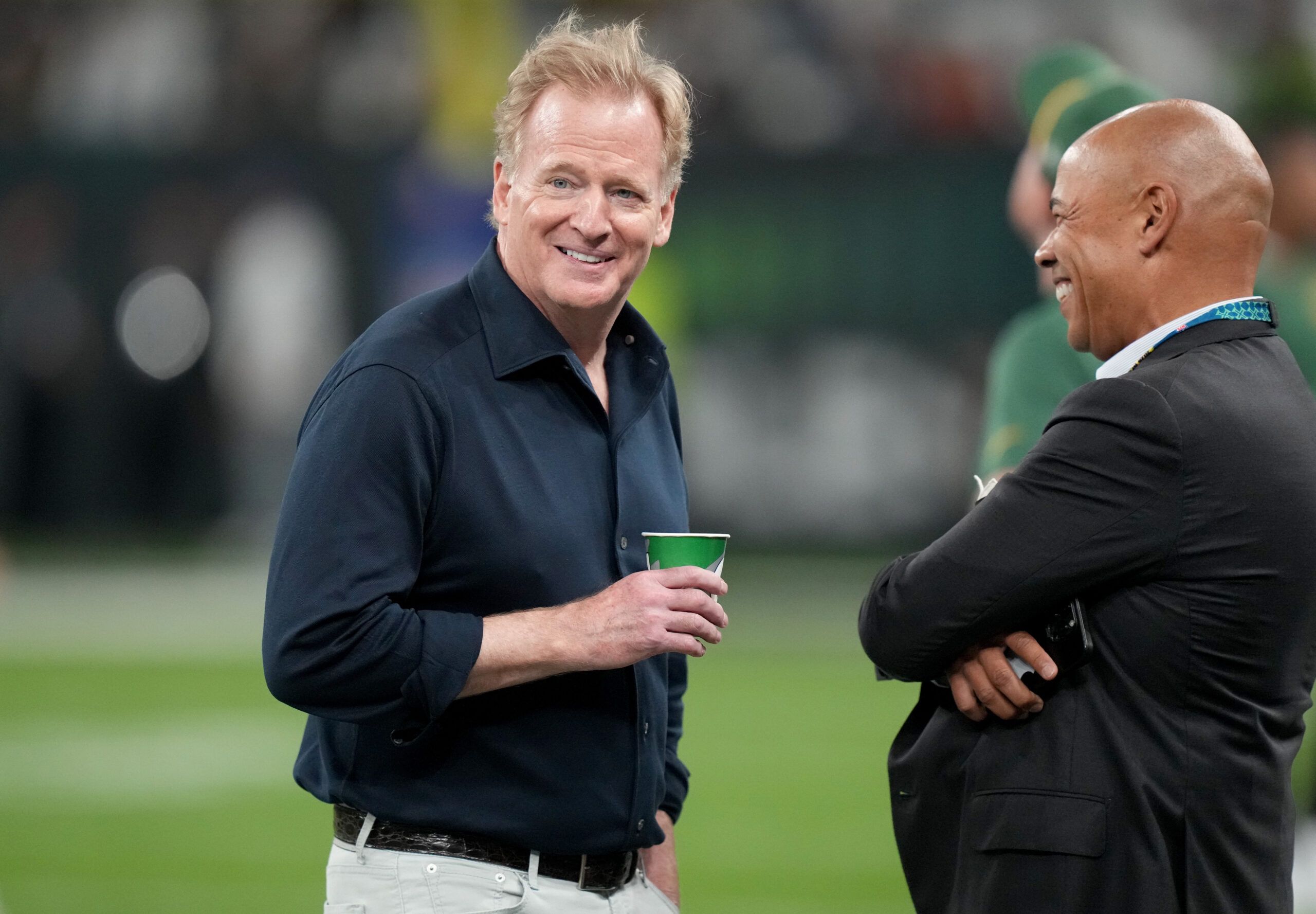 Sep 6, 2024; Sao Paulo, BRA; NFL commissioner Roger Goodell talks to NFL Players Association executive director Lloyd Howell before a game in Brazil between the Green Bay Packers and Philadelphia Eagles at Neo Quimica Arena. Mandatory Credit: Kirby Lee-Imagn Images