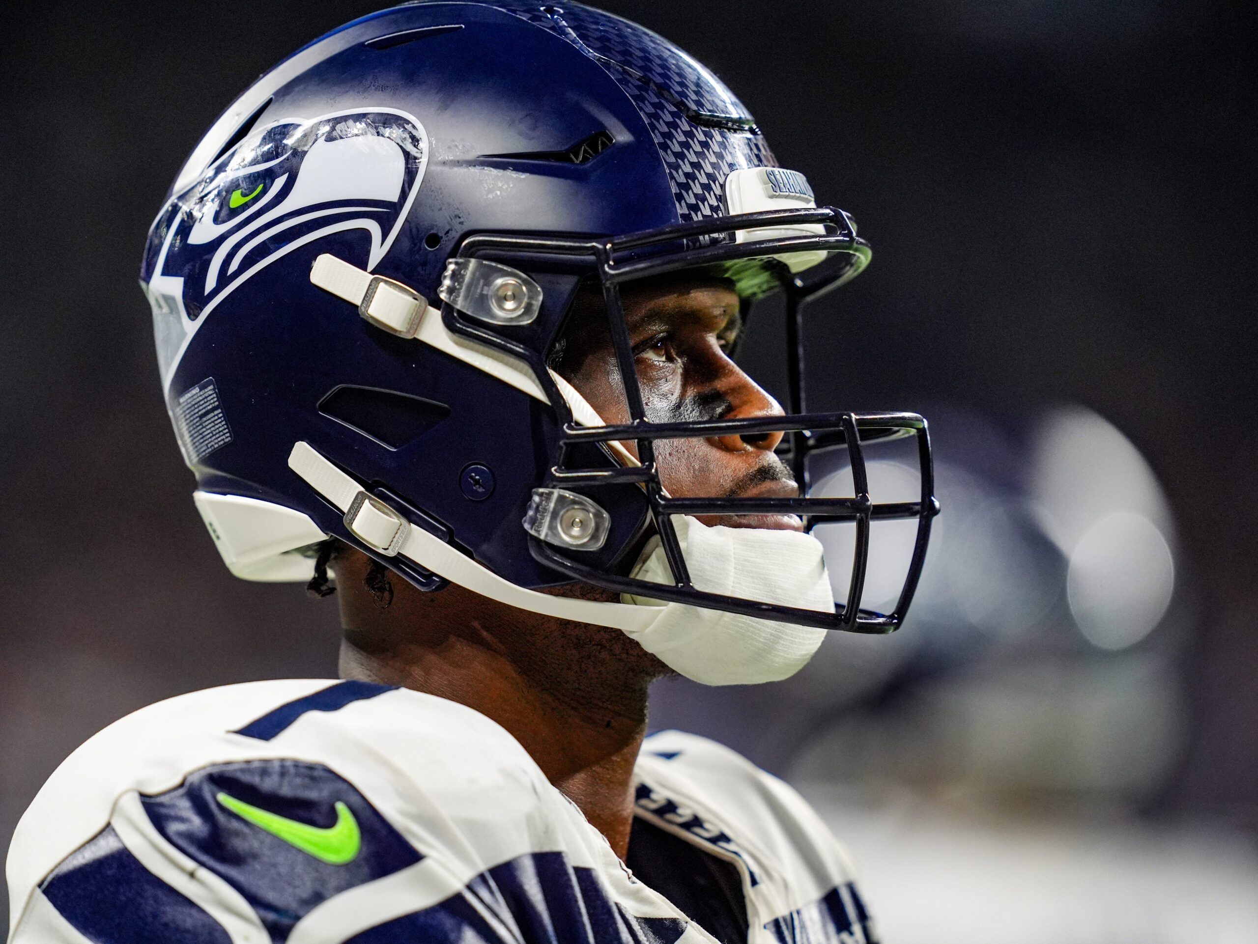 Seattle Seahawks quarterback Geno Smith (7) looks at the scoreboard after the Detroit Lions scored a touchdown during the N.F.L. game against the Seattle Seahawks at Ford Field in Detroit, Tuesday, Oct. 1, 2024.