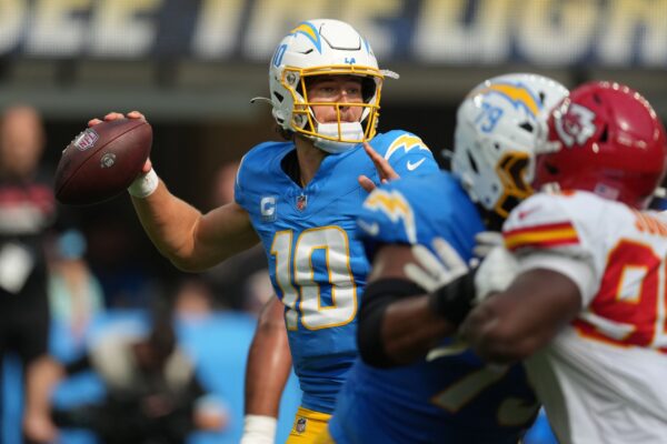 Sep 29, 2024; Inglewood, California, USA; Los Angeles Chargers quarterback Justin Herbert (10) throws the ball in the second quarter against the Kansas City Chiefs at SoFi Stadium. Mandatory Credit: Kirby Lee-Imagn Images