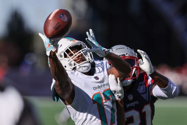 Oct 6, 2024; Foxborough, Massachusetts, USA; Miami Dolphins wide receiver Jaylen Waddle (17) attempts to catch a pass during the second half against the New England Patriots at Gillette Stadium. Mandatory Credit: Paul Rutherford-Imagn Images