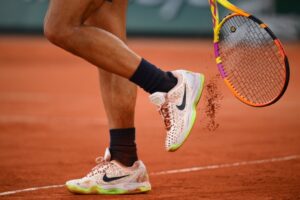 The Impact of Court Surface on Tennis Betting: Insights from World Tennis Magazine