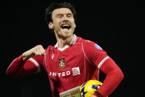 Wrexham Celebrates a 'Statement Win' as Moore Shines with a Hat Trick!n