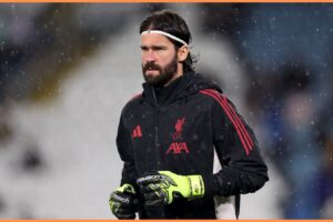 Alisson Weighs In: Liverpool Keeper Chooses Between Salah and Slot Amid Rising Tensionsn